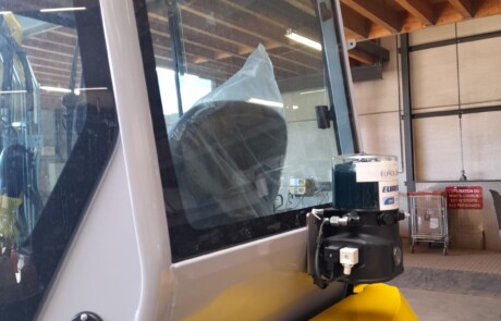 Smeersysteem op Wacker Neuson EZ26 van The City Partner
