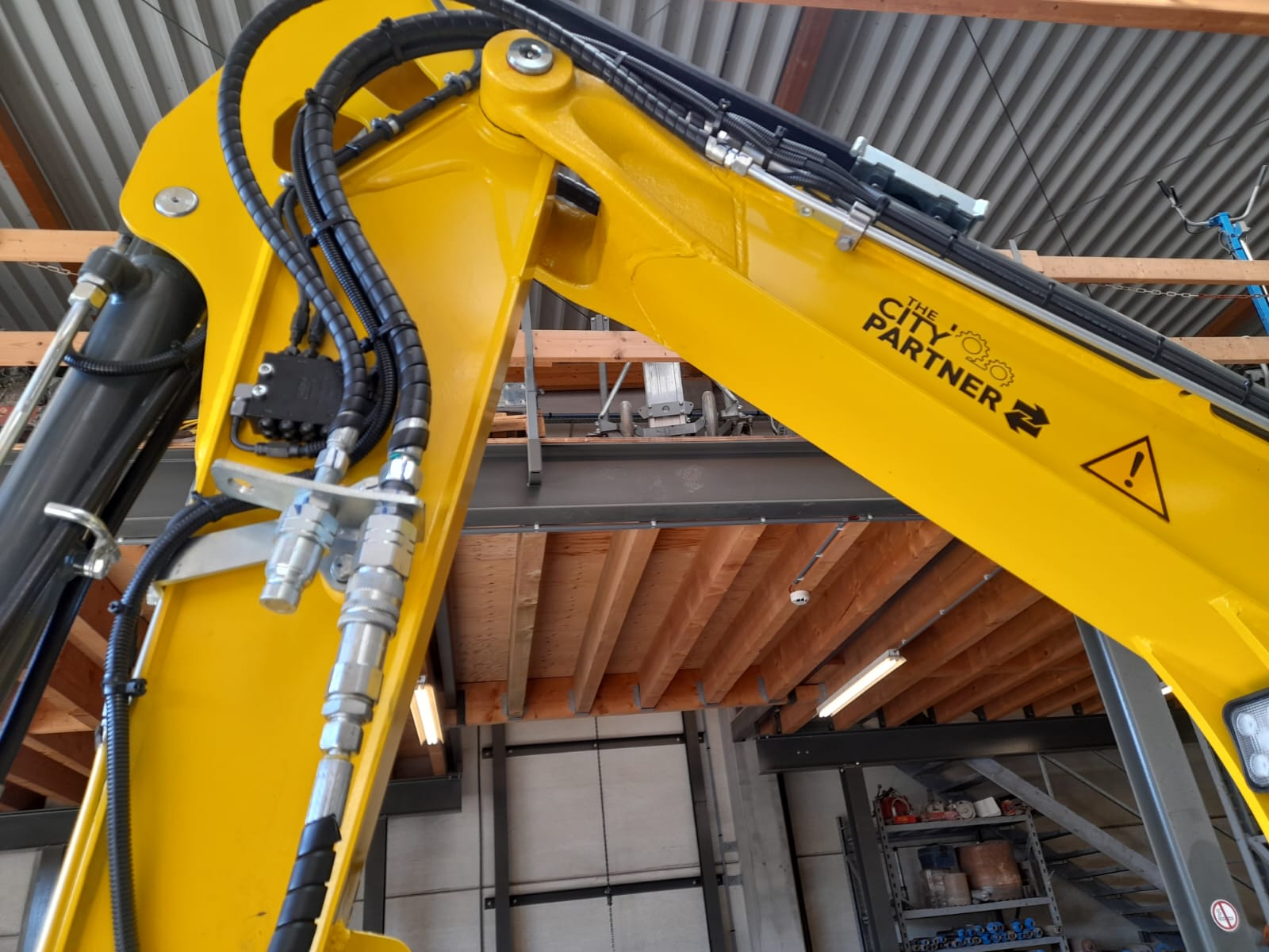 Smeersysteem op Wacker Neuson EZ26 van The City Partner